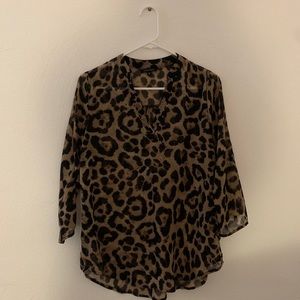 Women’s Boutique Cheetah print blouse.